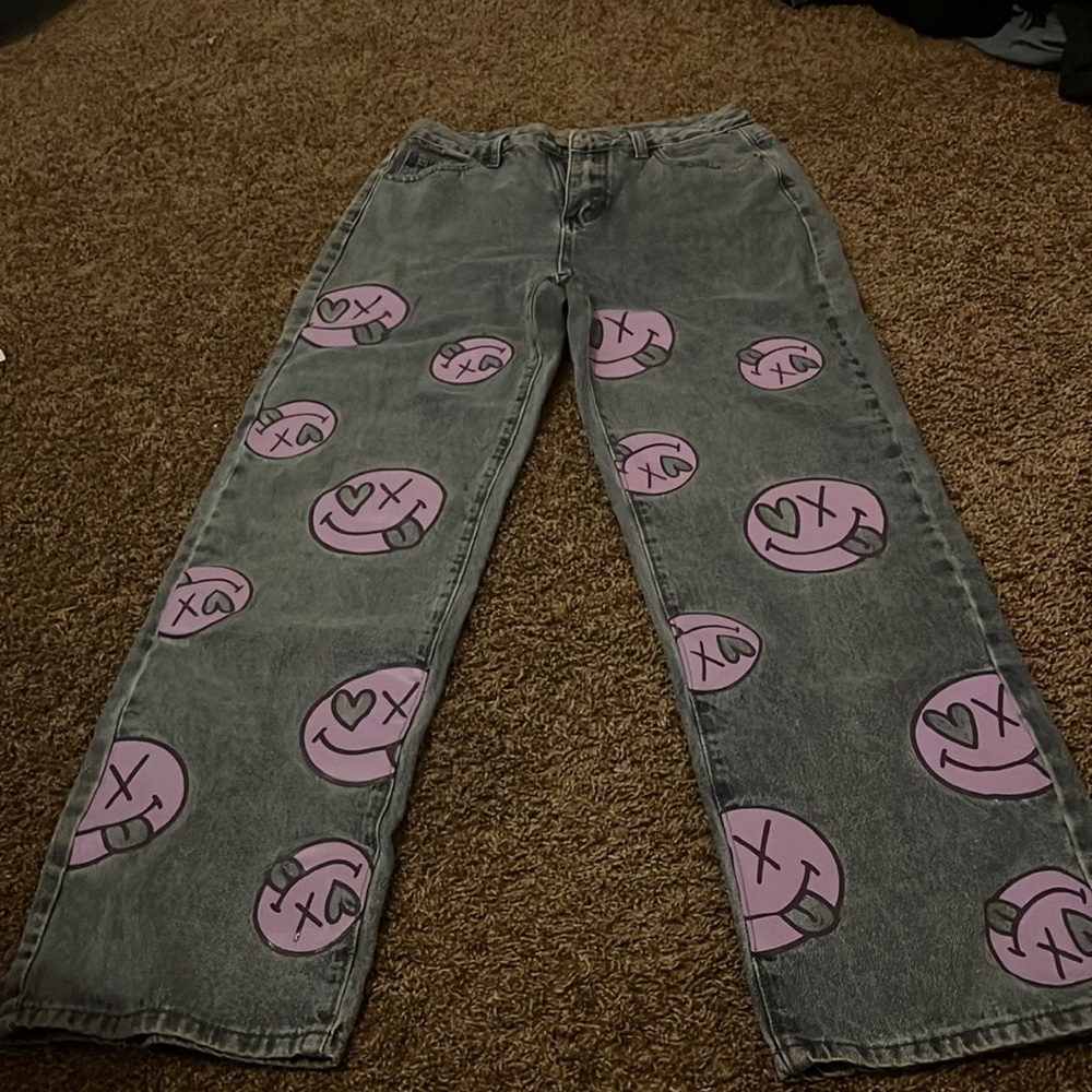 light-wash high-rise straight-leg denim jeans with purple face design